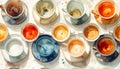 Overhead View of Assorted Empty Coffee and Tea Cups with Saucers on a White Table Royalty Free Stock Photo