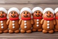 Overhead view of assorted gingerbread cookies arranged on the right side of a festive table