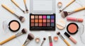 Overhead View of Assorted Makeup Products and Brushes on a Marble Surface cosmetics beauty Royalty Free Stock Photo