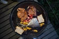 bbq grill with meat, fish, and vegetables Royalty Free Stock Photo