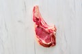 Overhead view of beef ribeye steak bone-in Royalty Free Stock Photo