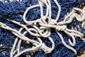 overhead view blue fishing net with white rope. High quality photo Royalty Free Stock Photo
