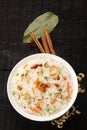 Overhead view-Bowl of delicious vegetarian fried rice with basmati rice