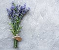 Overhead view of a bundle of fresh lavender flowers with blank tag