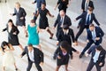 Overhead View Of Businesspeople Dancing In Office Lobby Royalty Free Stock Photo