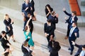 Overhead View Of Businesspeople Dancing In Office Lobby Royalty Free Stock Photo