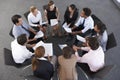 Overhead View Of Businesspeople Seated In Circle At Company Semi Royalty Free Stock Photo