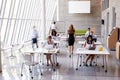 Overhead View Of Businesspeople Working At Desks In Office Royalty Free Stock Photo