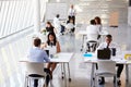 Overhead View Of Businesspeople Working At Desks In Office Royalty Free Stock Photo