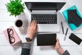 Overhead view of businesswoman working at computer in office Royalty Free Stock Photo