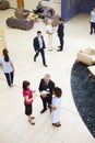 Overhead View Of Busy Hospital Reception