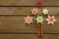 Overhead view of Christmas tree made with star shape cookies and cinnamon sticks Royalty Free Stock Photo