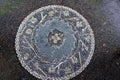 Overhead View of a Circular Garden Pebble Mosaic.