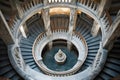 overhead view of a circular marble staircase