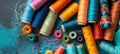 Overhead View of Colorful Thread Spools and Embroidery Project in Progress Royalty Free Stock Photo