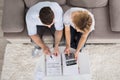 Overhead View Of A Couple Calculating Bills Royalty Free Stock Photo