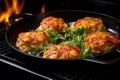 overhead view of crab cakes frying in a hot pan Royalty Free Stock Photo