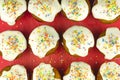 Overhead view of decorative iced cupcakes Royalty Free Stock Photo