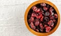 Dried Cranberries in Wooden Bowl Royalty Free Stock Photo