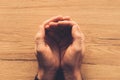 Overhead view of empty cupped male hands