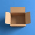 Overhead view empty open carton box on bright blue background Royalty Free Stock Photo