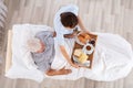 Nurse Serving Food To Senior Male Patient In Clinic Royalty Free Stock Photo