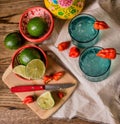 Overhead view of a flat-lay cocktail beverage arrangement