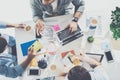 overhead view of focused young businessmen working on new project together business Royalty Free Stock Photo