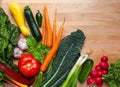 Overhead view of fresh healthy produce on a wooden cutting board