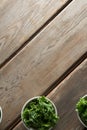 Overhead view of freshn kale in bowls on table Royalty Free Stock Photo