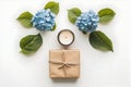 Gift box candle hydrangea arrangement Royalty Free Stock Photo