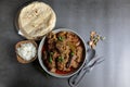 Overhead view of Goat curry, Mutton curry, Nihari, Rogan Josh in a bowl with Chapati and plain Rice Royalty Free Stock Photo