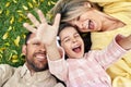 Overhead view of a happy family spending time together in the park. A handsome father makes a selfie together with his joyful Royalty Free Stock Photo