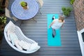 Overhead View Of Healthy Mature Woman At Home Exercising On Deck  With Dumbbell Hand Weights Royalty Free Stock Photo