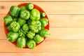 Overhead view of large red bowl filled peppers Royalty Free Stock Photo