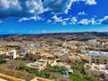 Overhead view of mountain town at sunset. Beautiful view of building and mountain. Mediterranean village with church from above. Royalty Free Stock Photo