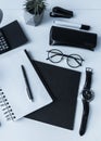 overhead view of notebook and pen with watch Royalty Free Stock Photo