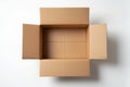 Overhead view of an open empty cardboard box with flaps unfolded isolated on white background Royalty Free Stock Photo
