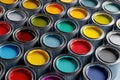 Overhead View of Open Paint Cans with Various Colorful Paints and Seamless Background Design Royalty Free Stock Photo