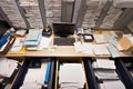 overhead view of an organized office with neat stacks of documents, files, and binders Royalty Free Stock Photo