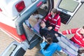 overhead view of paramedic team moving injured man Royalty Free Stock Photo