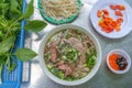 Overhead view photo of delicious beef noodle soup Vietnamese Pho