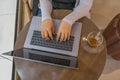 Overhead view photo of woman hand typing laptop keyboard Royalty Free Stock Photo