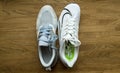 Overhead view professional running shoes manufactured by Nike comparing two