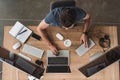 overhead view of programmer using computers