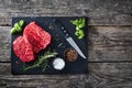 Overhead view of fresh raw beef steaks Royalty Free Stock Photo