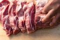 Overhead view of raw piece of pork on wooden background. Piece of fresh boneless pork, neck part or collar. Big piece of red raw m Royalty Free Stock Photo