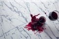 overhead view of red wine spill on marble counter Royalty Free Stock Photo