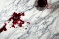 overhead view of red wine spill on marble counter Royalty Free Stock Photo