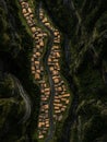 Overhead view of a remote village nestled between mountains and a river Royalty Free Stock Photo